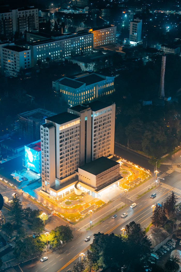 Stunning aerial night view of illuminated buildings in Addis Ababa, Ethiopia.